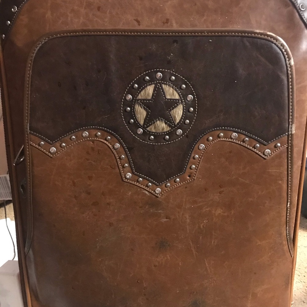 Large Montana West rolling luggage